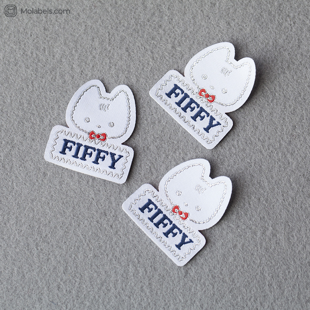 Custom embroidered clothing tags laser cut